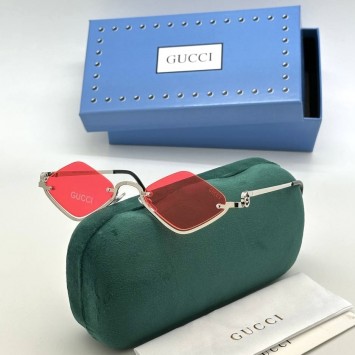 Солнцезащитные очки Gucci