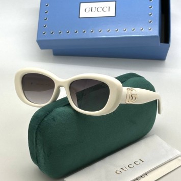 Солнцезащитные очки Gucci