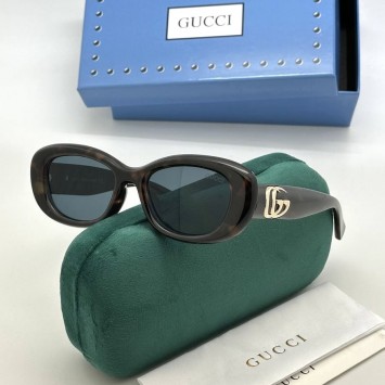Солнцезащитные очки Gucci