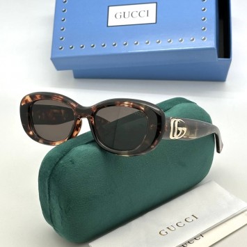 Солнцезащитные очки Gucci