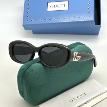 Солнцезащитные очки Gucci