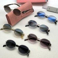 Солнцезащитные очки Miu Miu