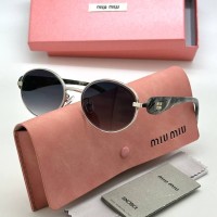 Солнцезащитные очки Miu Miu