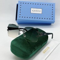 Солнцезащитные очки Gucci