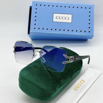 Солнцезащитные очки Gucci