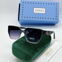 Солнцезащитные очки Gucci