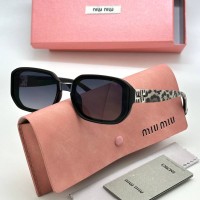 Солнцезащитные очки Miu Miu