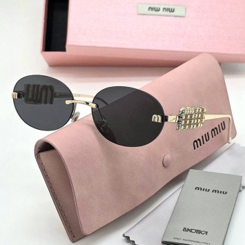 Солнцезащитные очки Miu Miu