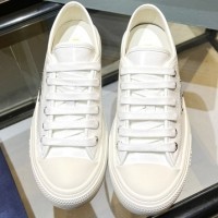 Кожаные кеды Prada с логотипом