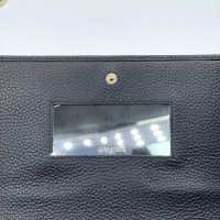 Мини-сумка Gucci GG Marmont на ремне-цепочке