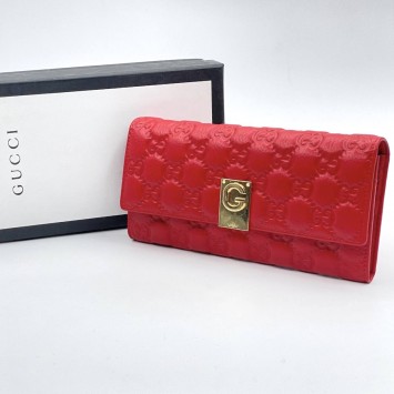 Стеганый кошелек Gucci с орнаментом GG