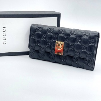 Стеганый кошелек Gucci с орнаментом GG