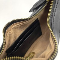 Мини-сумка Gucci GG Marmont из стеганой кожи