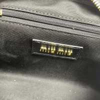 Кожаная сумка Miu Miu с ручкой